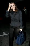 th_68688_celebrity-paradise.com-The_Elder-Eva_Longoria_2010-01-05_-_Leaves_Beso_6118_122_1095lo.jpg
